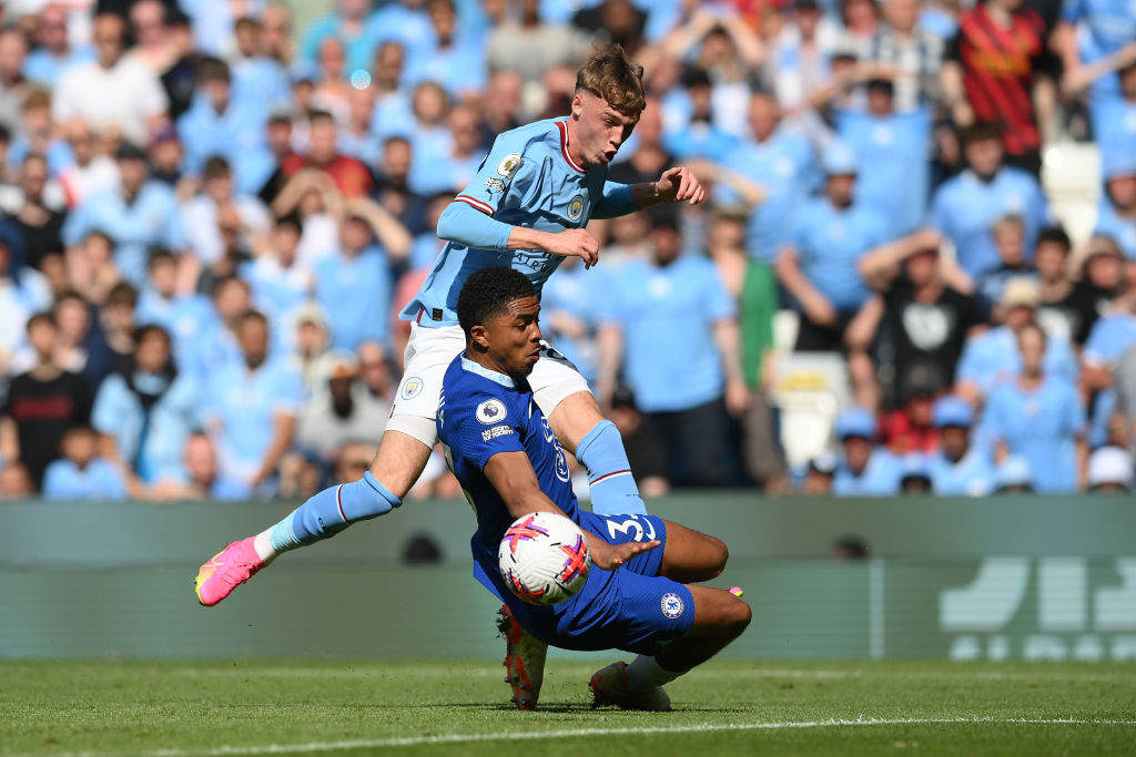 Cole Palmer of Manchester City is challenged by Wesley Fofana of Chelsea during the Premier League match between Manchester City and Chelsea FC at ...