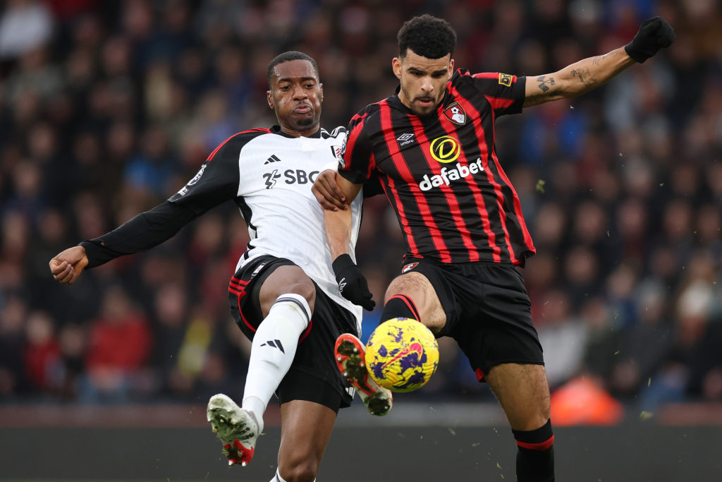 Dominic Solanke of AFC Bournemouth battles for the ball with Fulham's Tosin Adarabioyo during the Premier League match between AFC Bournemouth and ...