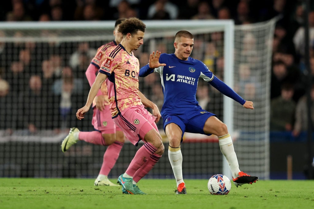 Alfie Gilchrist of Chelsea is challenged by Ethan Ampadu of Leeds United during the Emirates FA Cup Fifth Round match between Chelsea and Leeds Uni...