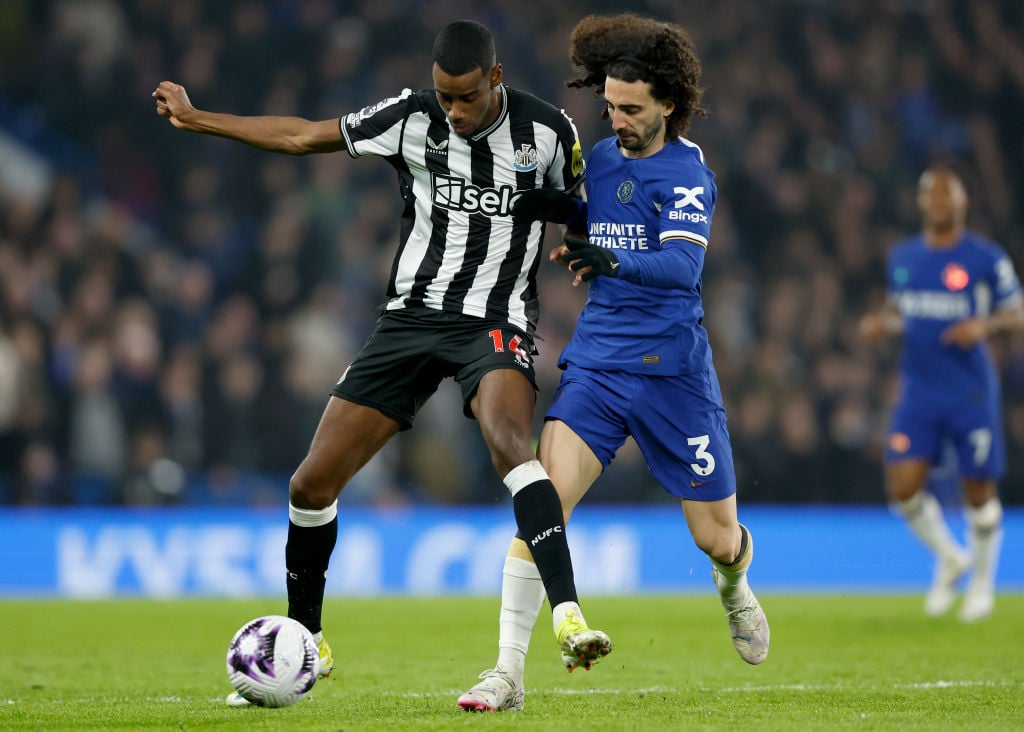 Alexander Isak of Newcastle United and Marc Cucurella of Chelsea challenge during the Premier League match between Chelsea FC and Newcastle United ...