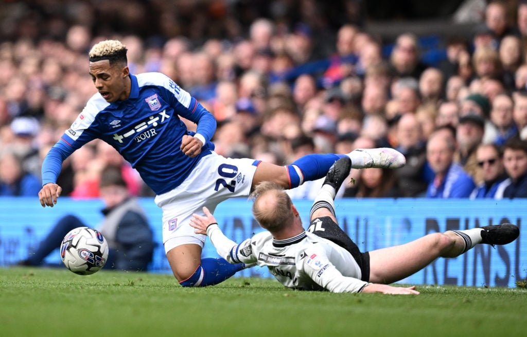 Omari Hutchinson of Ipswich Town is tackled by s10 during the Sky Bet Championship match between Ipswich Town and Sheffield Wednesday at Portman Ro...