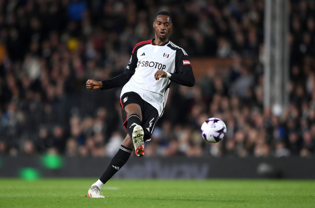 Tosin Adarabioyo of Fulham passes the ball during the Premier League match between Fulham FC and Tottenham Hotspur at Craven Cottage on March 16, 2...