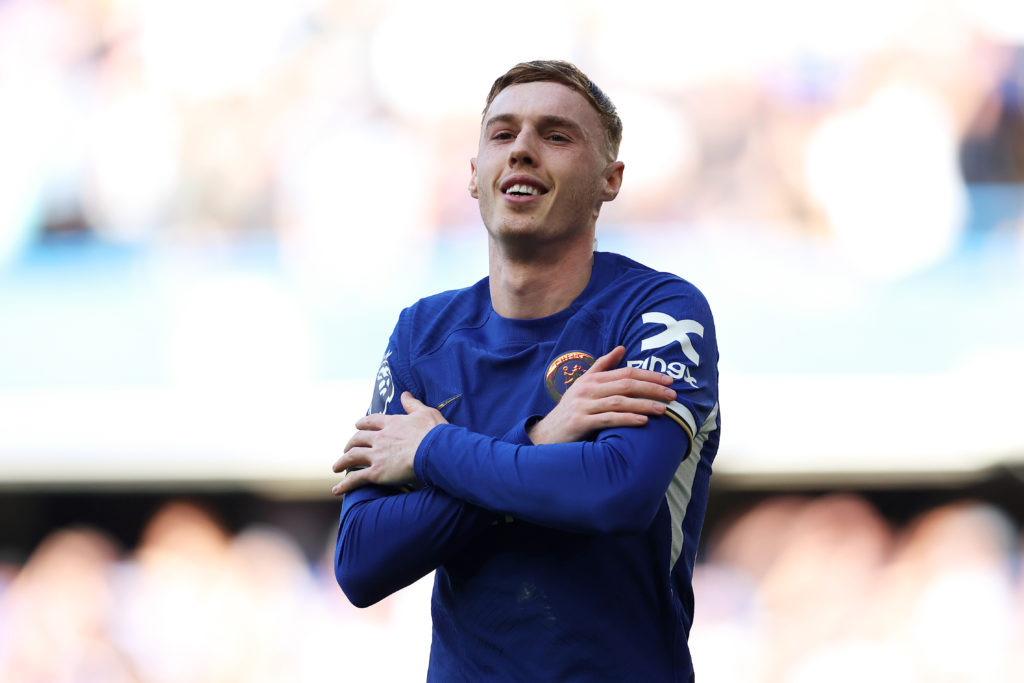 Cole Palmer of Chelsea celebrates scoring his team's first goal from a penalty kick during the Premier League match between Chelsea FC and Burnley ...