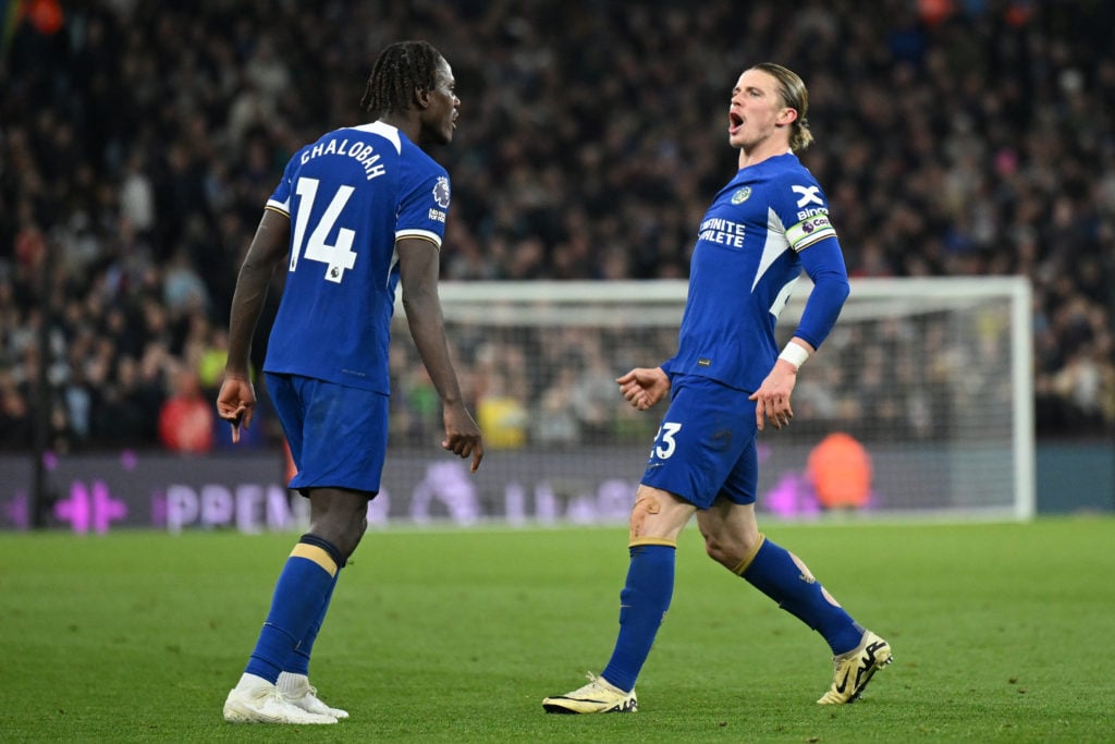Conor Gallagher of Chelsea celebrates scoring his team's second goal with teammate Trevoh Chalobah during the Premier League match between Aston Vi...