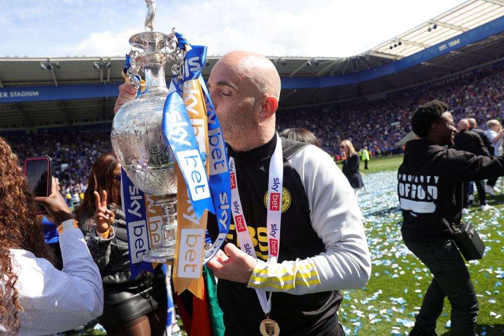 Leicester City Manager Enzo Maresca kisses the Sky Bet Championship trophy after the Sky Bet Championship match between Leicester City and Blackbur...