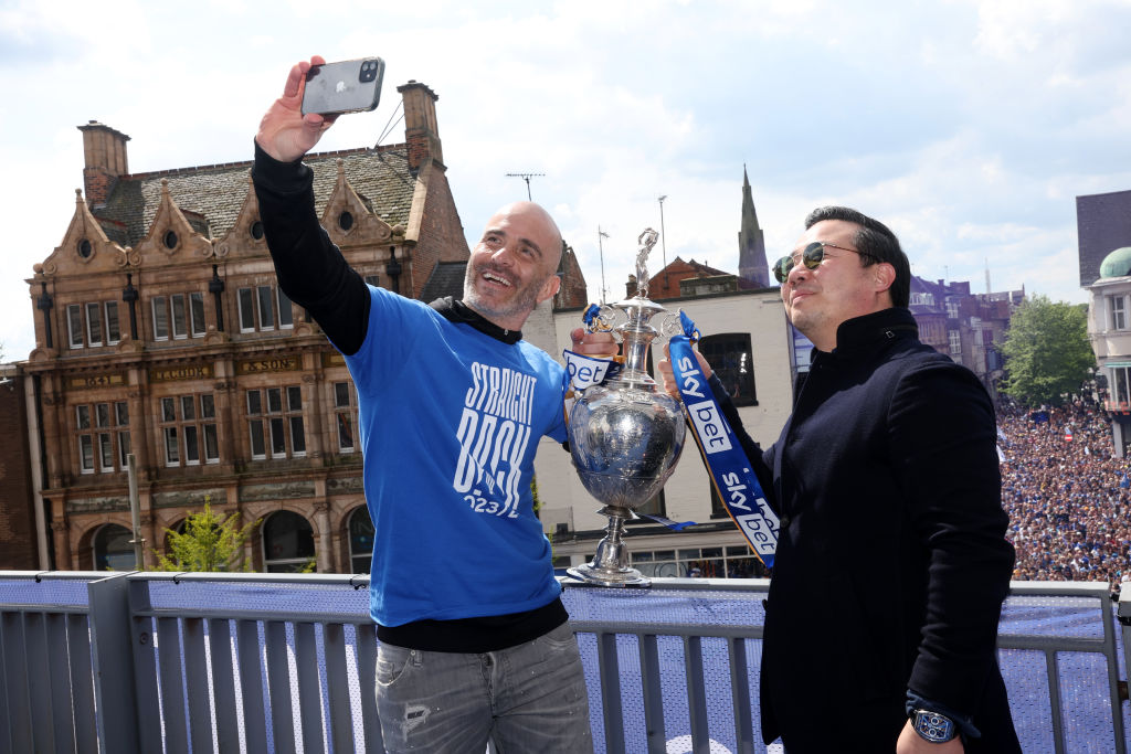 Leicester City Chairman Aiyawatt Srivaddhanaprabha and Leicester City Manager Enzo Maresca pose with the Sky Bet Championship Trophy during the Lei...