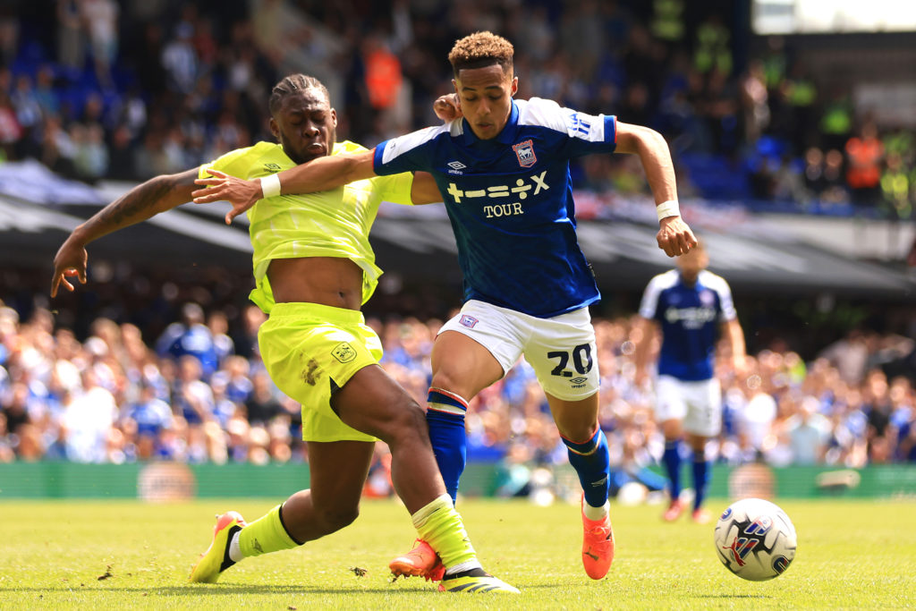 Omari Hutchinson of Ipswich Town and Alex Matos of Huddersfield Town battle for possession during the Sky Bet Championship match between Ipswich To...