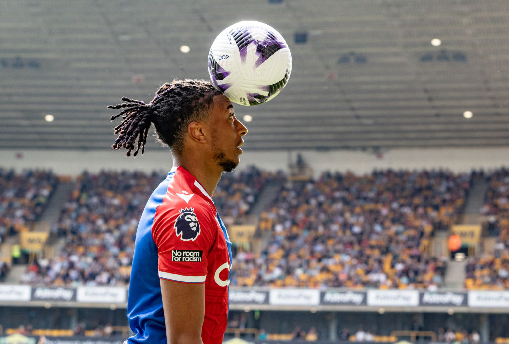 Crystal Palace's Michael Olise keeps his eye on the ball during the Premier League match between Wolverhampton Wanderers and Crystal Palace at Moli...