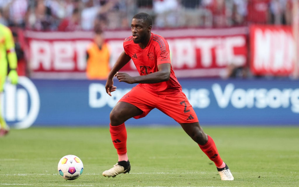 Dayot Upamecano of FC Bayern Muenchen runs with a ball during the Bundesliga match between FC Bayern München and VfL Wolfsburg at Allianz Arena on ...