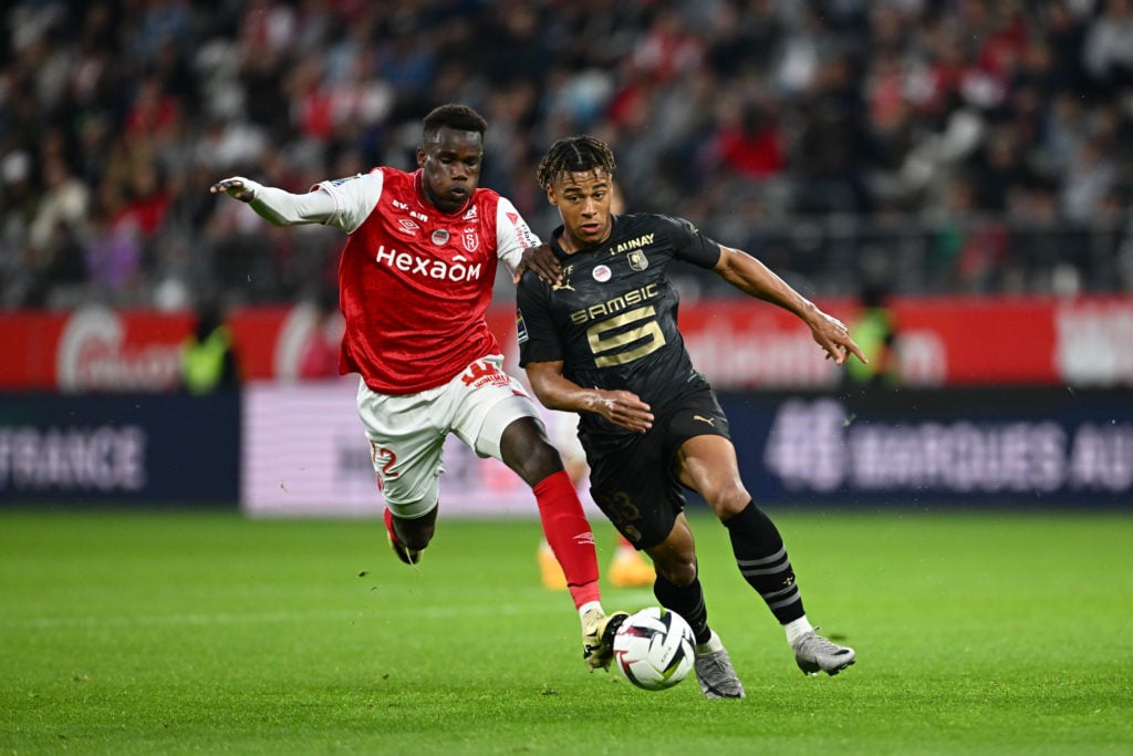 Desire DOUE of Stade Rennais FC and Oumar DIAKITE of Reims during the Ligue 1 Uber Eats match between Reims and Rennes at Stade Auguste Delaune on ...