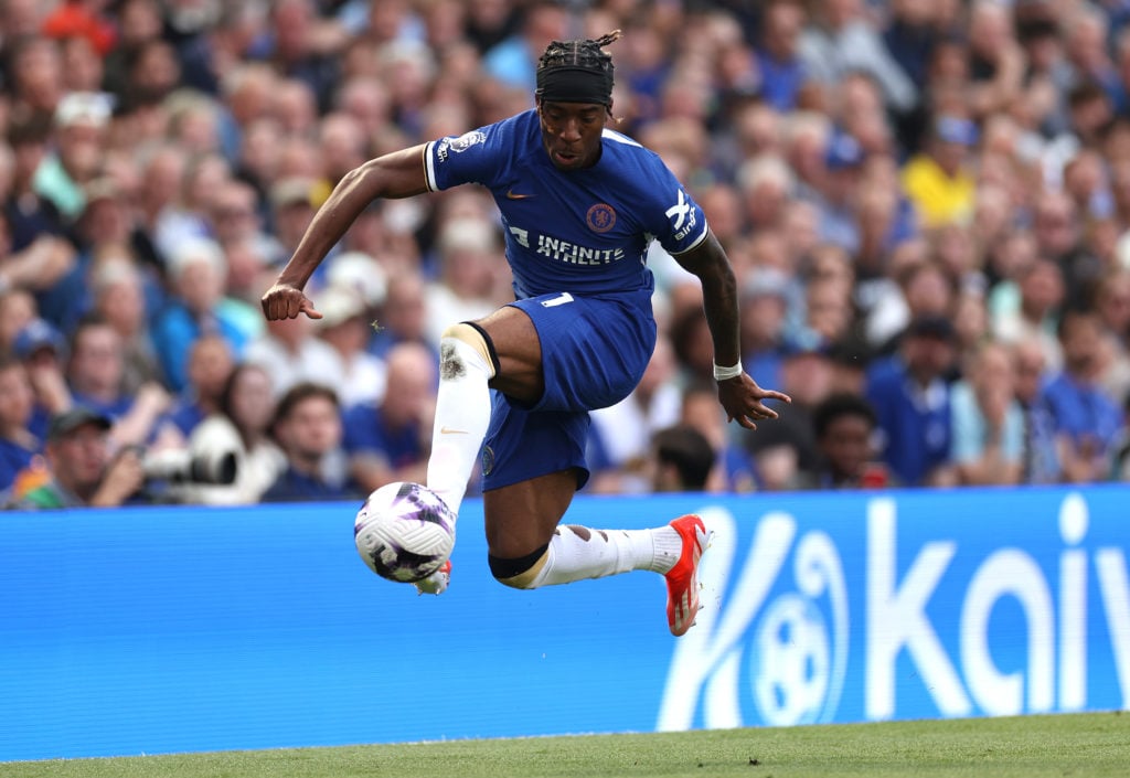 Noni Madueke of Chelsea controls the ball during the Premier League match between Chelsea FC and AFC Bournemouth at Stamford Bridge on May 19, 2024...
