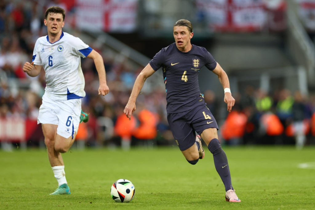 Conor Gallagher of England in action with Benjamin Tahirovic of Bosnia & Herzegovina during the international friendly match between England an...