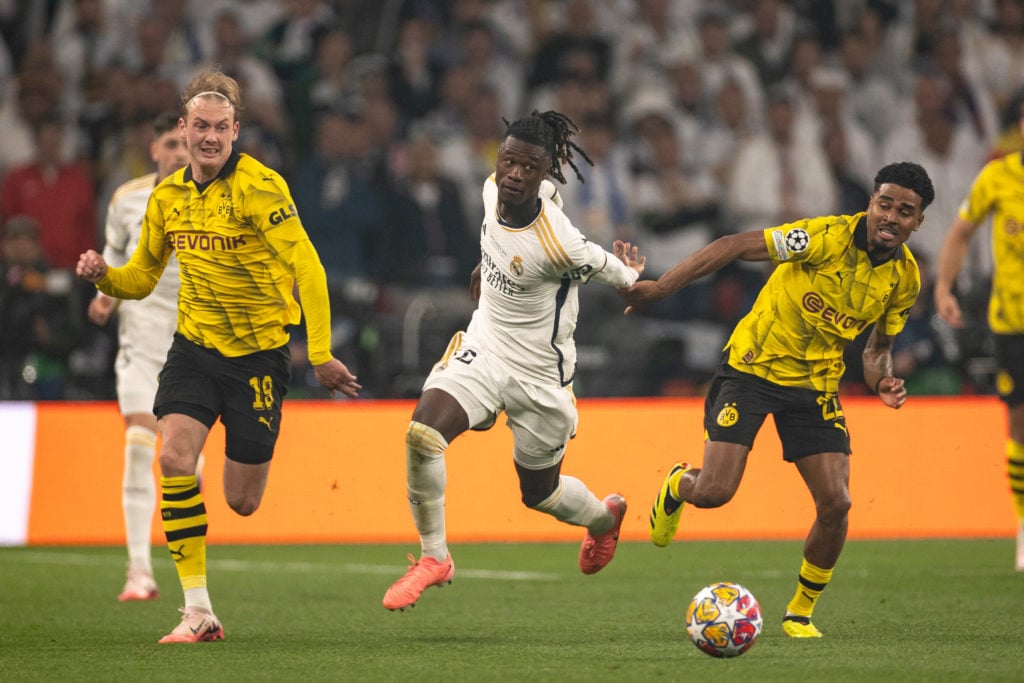Eduardo Camavinga (Real Madrid) is shrugging off Julian Brandt (Borussia Dortmund) and Ian Maatsen (Borussia Dortmund) during the UEFA Champions Le...
