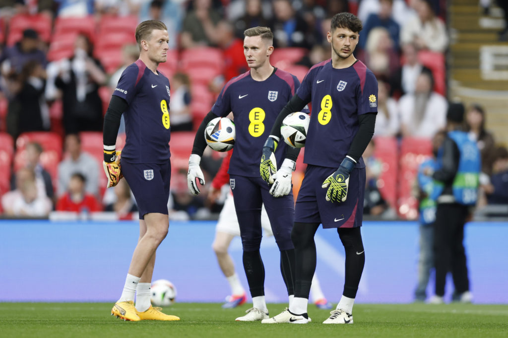 Jordan Pickford, Dean Henderson and James Trafford goalkeepers of England warm up before the international friendly match between England and Icela...