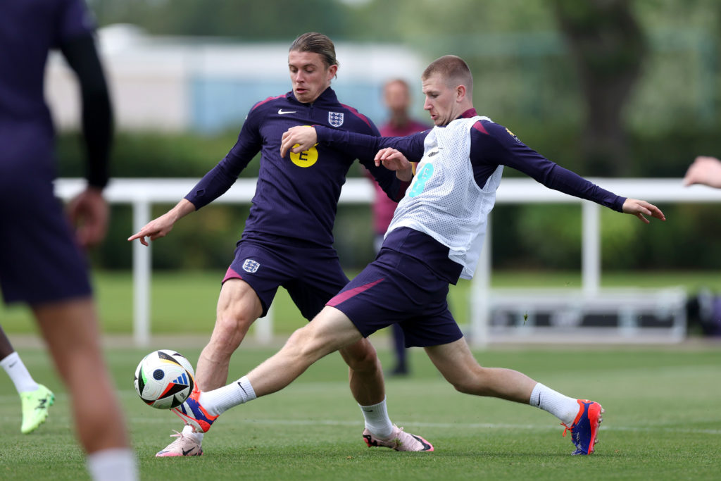 Conor Gallagher and Adam Wharton of England battle for possession during a training session at Tottenham Hotspur Training Centre on June 06, 2024 i...