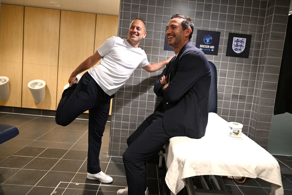 Joe Cole of England interacts with Frank Lampard, Manager of England inside the dressing room prior to Soccer Aid for UNICEF 2024 at Stamford Bridg...