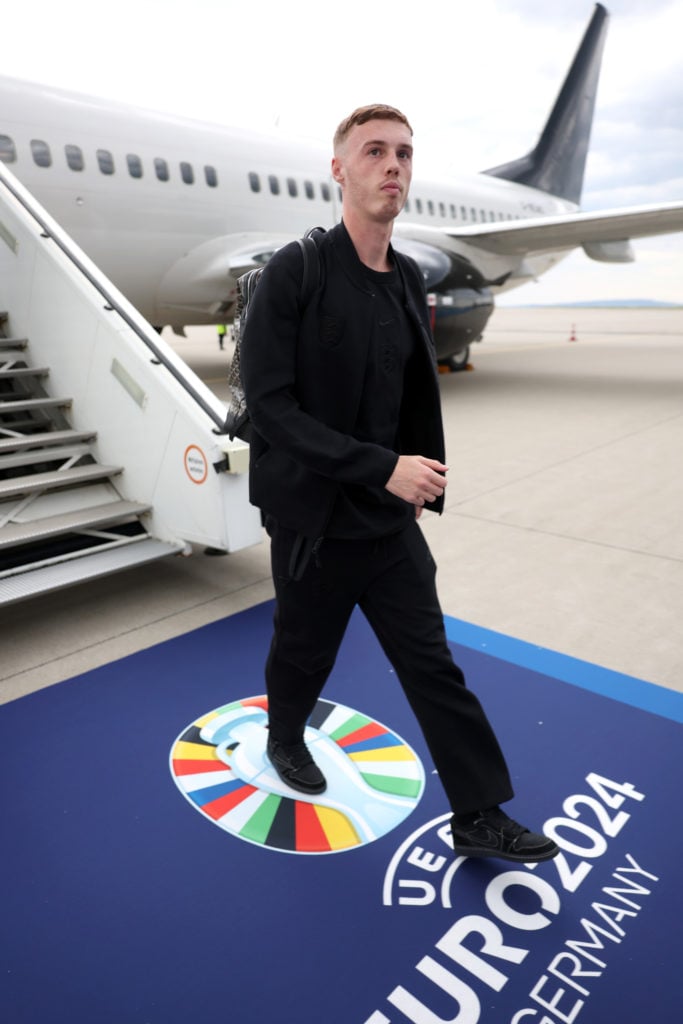 Cole Palmer of England walks from  the plane as the England team arrive ahead of the UEFA EURO 2024 Germany at Erfurt airport on June 10, 2024 in W...