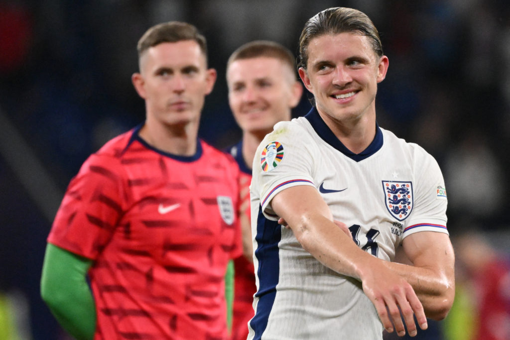England players including England's midfielder #16 Conor Gallagher react after the UEFA Euro 2024 Group C football match between Serbia and England...