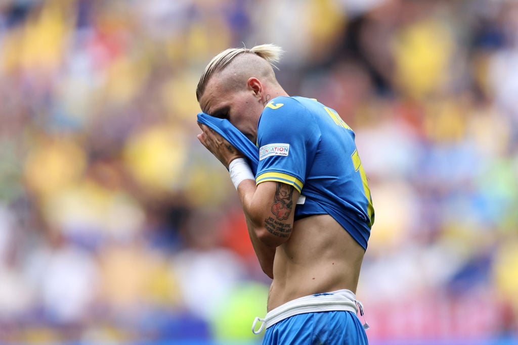 Mykhailo Mudryk of Ukraine wipes his face as he reacts during the UEFA EURO 2024 group stage match between Romania and Ukraine at Munich Football A...