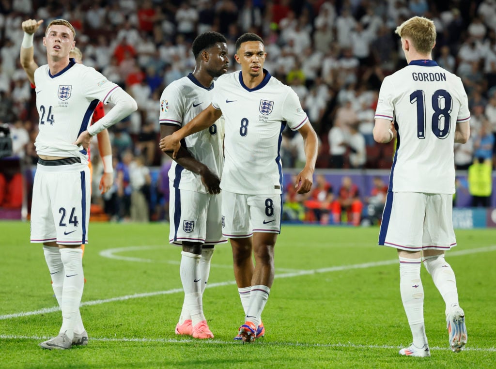 (L-R) Cole Palmer, Marc Guehi, Trent Alexander-Arnold, and Anthony Gordon of England shake hands after the UEFA EURO 2024 group stage match between...