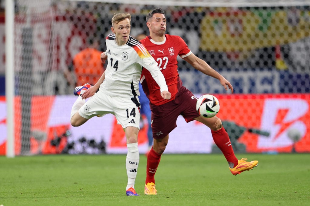 Maximilian Beier of Germany is challenged by Fabian Schaer of Switzerland during the UEFA EURO 2024 group stage match between Switzerland and Germa...