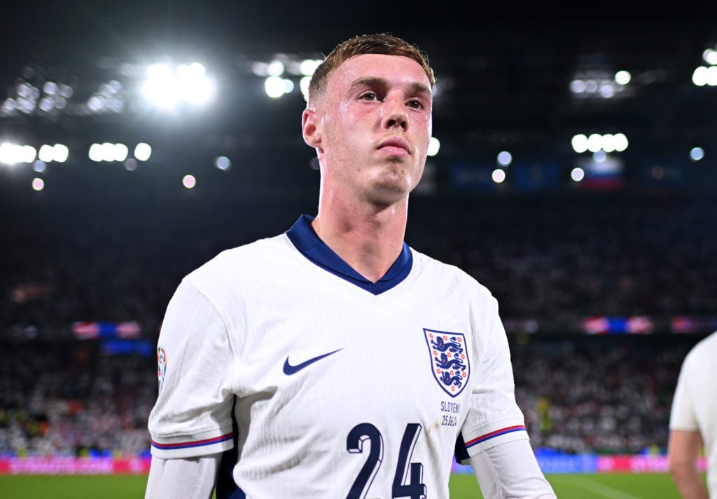 Cole Palmer of England looks on at full-time following the team's draw in the UEFA EURO 2024 group stage match between England and Slovenia at Colo...