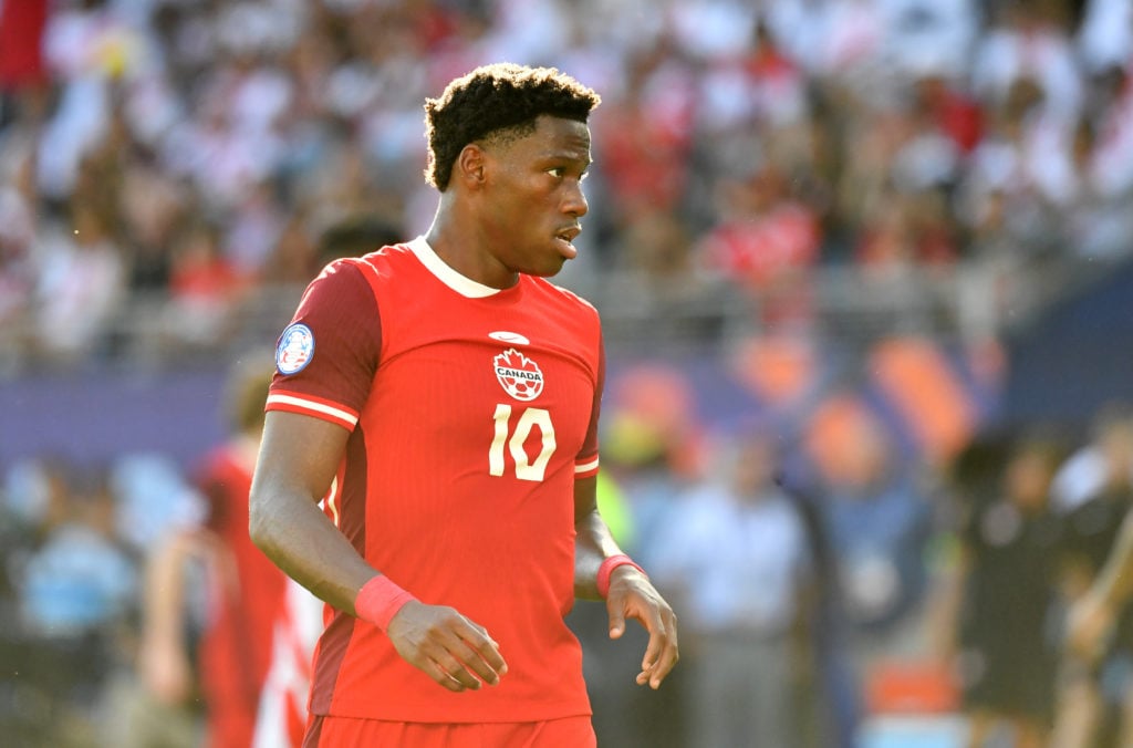 Jonathan David #10 of Canada running looks on during the CONMEBOL Copa America group A match between Peru and Canada  at Children's Mercy Park on J...