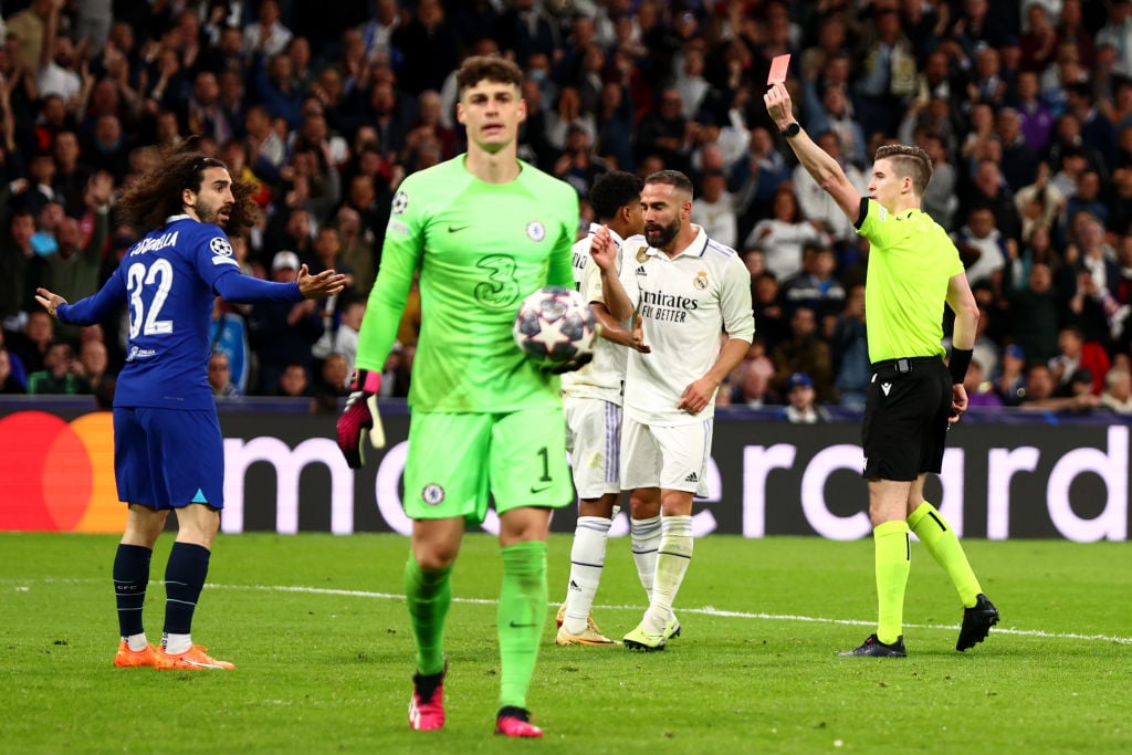 Referee Francois Letexier   shows a red card to Ben Chilwell of Chelsea during the UEFA Champions League Quarterfinal first leg match between Real ...