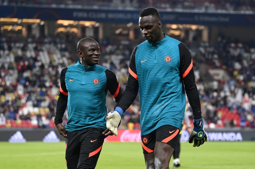 Ngolo Kante and Edouard Mendy of Chelsea speak during the warm up prior to the FIFA Club World Cup UAE 2021 Semi Final match between Al Hilal and C...
