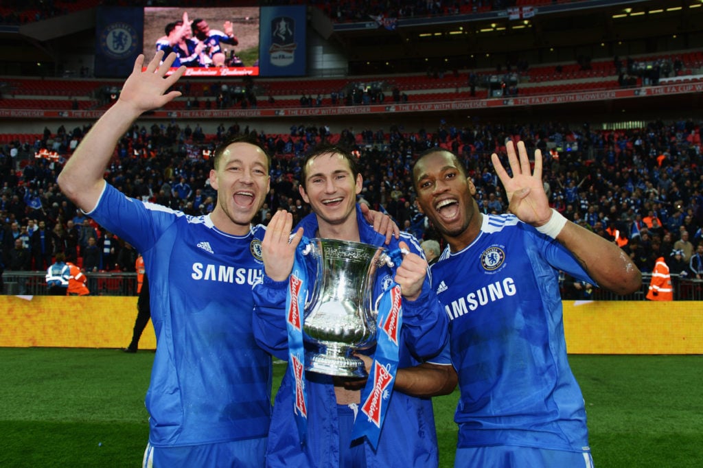 Frank Lampard, John Terry and Didier Drogba of Chelsea celebrate with the trophy after the  FA Cup Final with Budweiser between Liverpool and Chels...