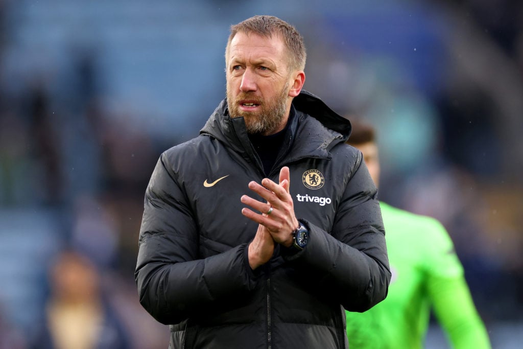 Graham Potter, Manager of Chelsea, applauds the fans after the team's victory during the Premier League match between Leicester City and Chelsea FC...