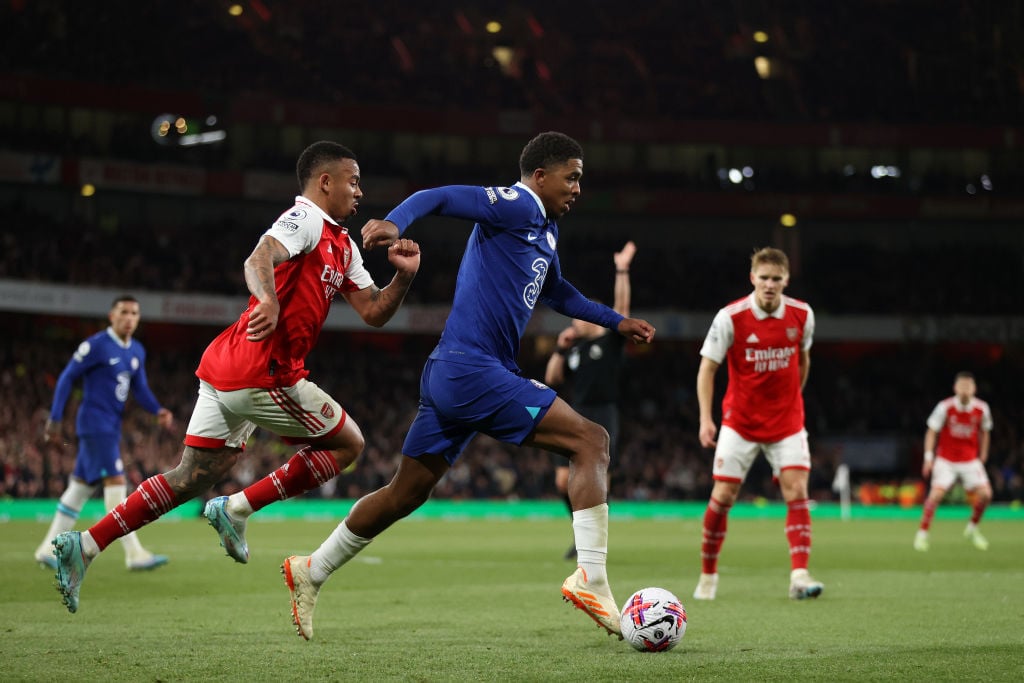 Wesley Fofana of Chelsea runs with the ball whilst under pressure from Gabriel Jesus of Arsenal during the Premier League match between Arsenal FC ...