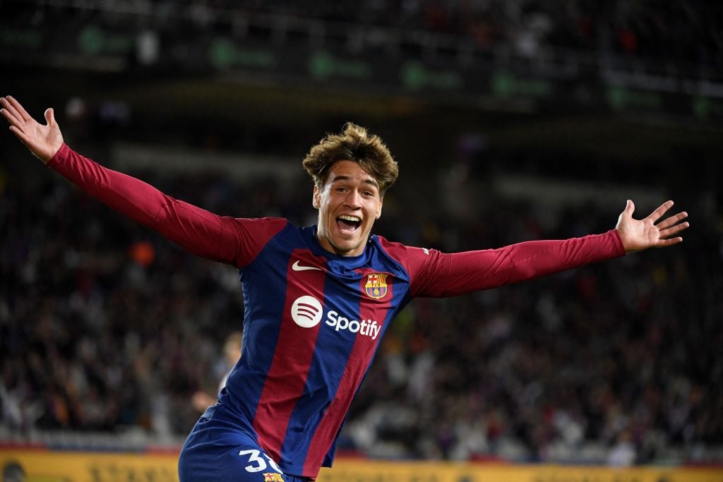 TOPSHOT - Barcelona's Spanish forward #38 Marc Guiu celebrates after scoring his team's first goal during the Spanish league football match between...