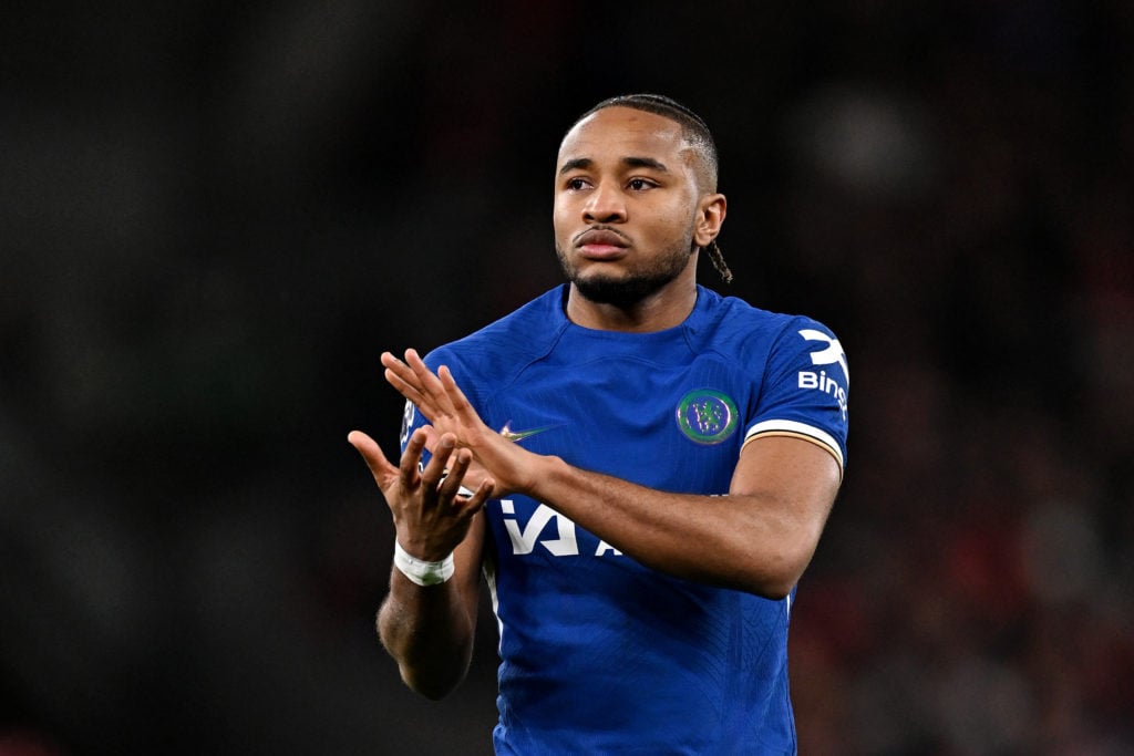 Christopher Nkunku of Chelsea applauds the fans after the team's defeat in the Premier League match between Liverpool FC and Chelsea FC at Anfield ...