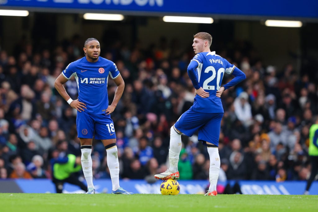 Christopher Nkunku and Cole Palmer of Chelsea look dejected after conceding during the Premier League match between Chelsea FC and Wolverhampton Wa...
