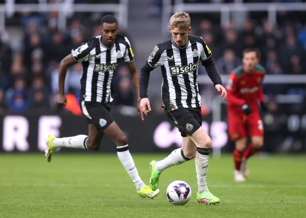 Newcastle United's Anthony Gordon runs with the ball as teammate Alexander Isak appears to overlap during the Premier League match between Newcastle...