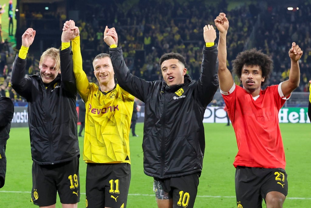Julian Brandt of Borussia Dortmund, Marco Reus of Borussia Dortmund, Jadon Sancho of Borussia Dortmund and Karim Adeyemi of Borussia Dortmund cheer...