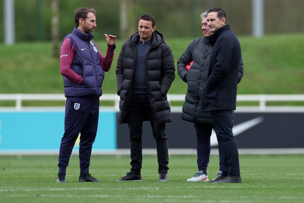 Gareth Southgate, Manager of England men's senior team, talks to Former England player Frank Lampard, John McDermott, FA Technical Director, and Jo...