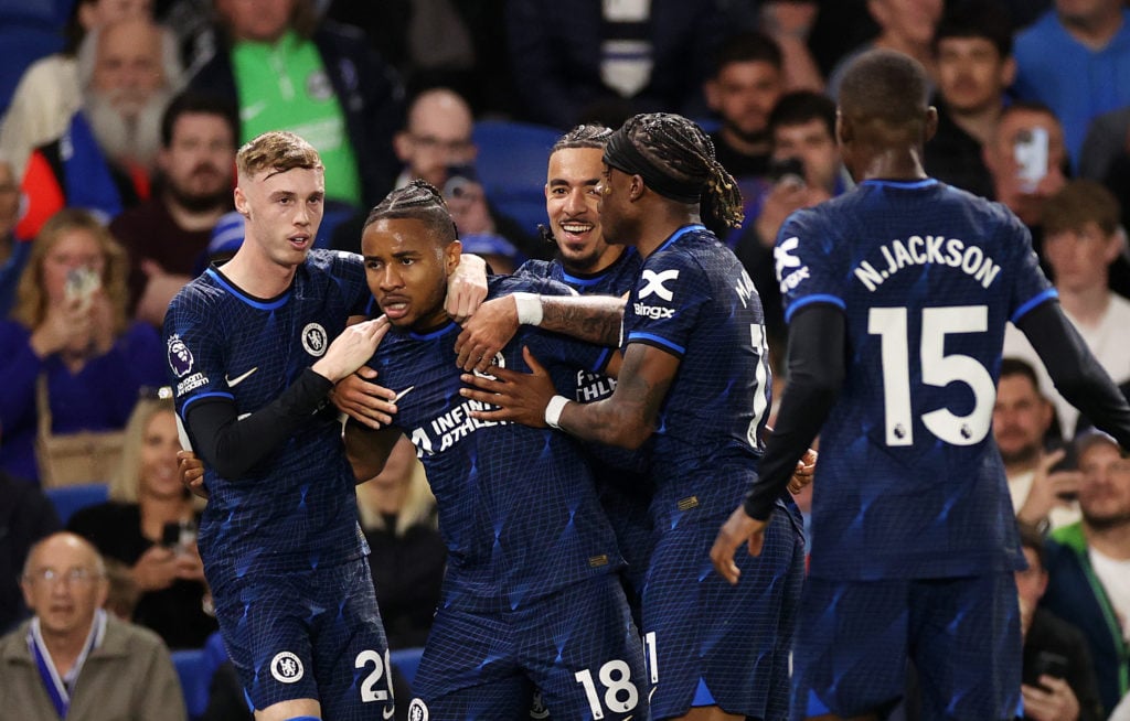 Christopher Nkunku of Chelsea celebrates scoring his team's second goal with teammates during the Premier League match between Brighton & Hove ...