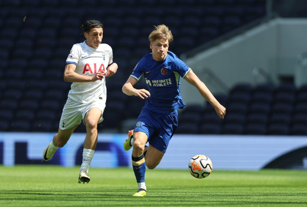 Jimmy-Jay Morgan of Chelsea U21 challenges for the ball against Yusuf Akhamrich Tottenham Hotspur U21of during the Premier League 2 Semi Final matc...