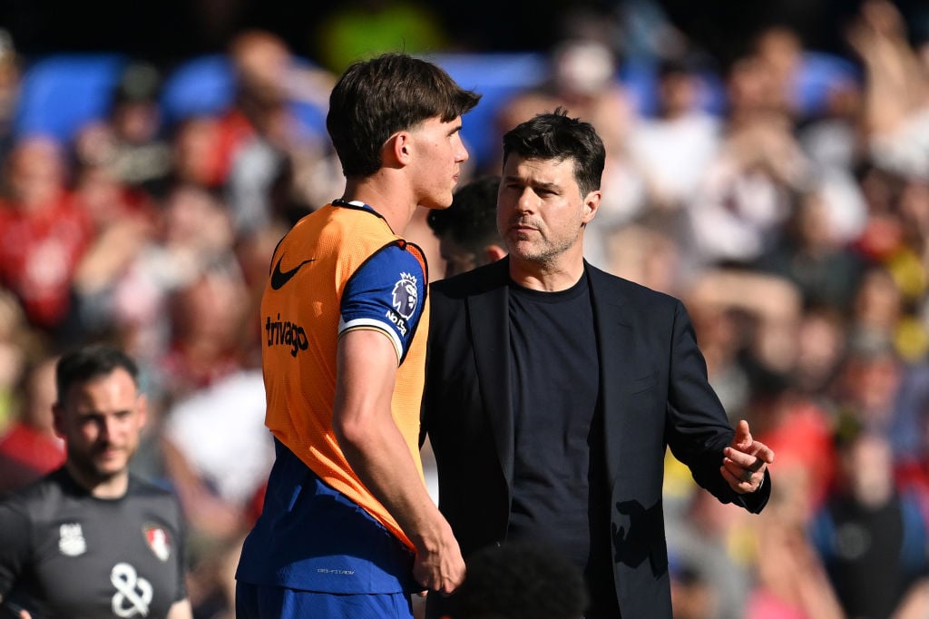 Mauricio Pochettino, Manager of Chelsea, speaks with Cesare Casadei of Chelsea on the touchline during the Premier League match between Chelsea FC ...