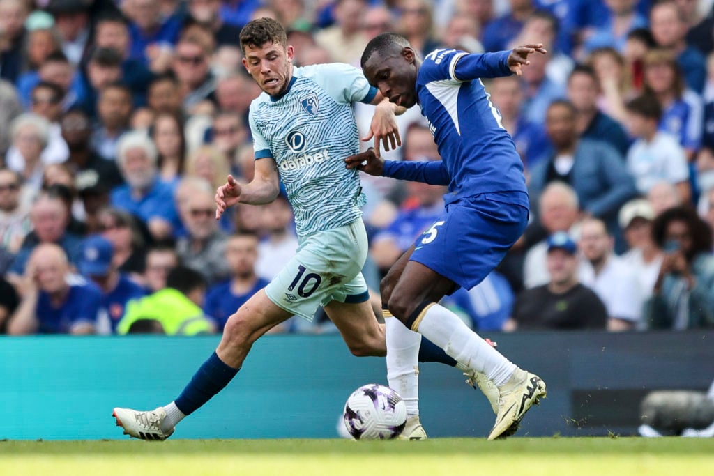 Ryan Christie of Bournemouth and Nicolas Jackson of Chelsea during the Premier League match between Chelsea FC and AFC Bournemouth at Stamford Brid...