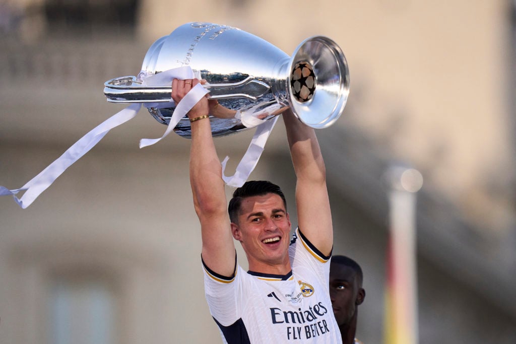 Kepa Arrizabalaga of Real Madrid celebrates with Trophy at Fuente de Cibeles during Real Madrid UEFA Champions League Trophy Parade on June 02, 202...