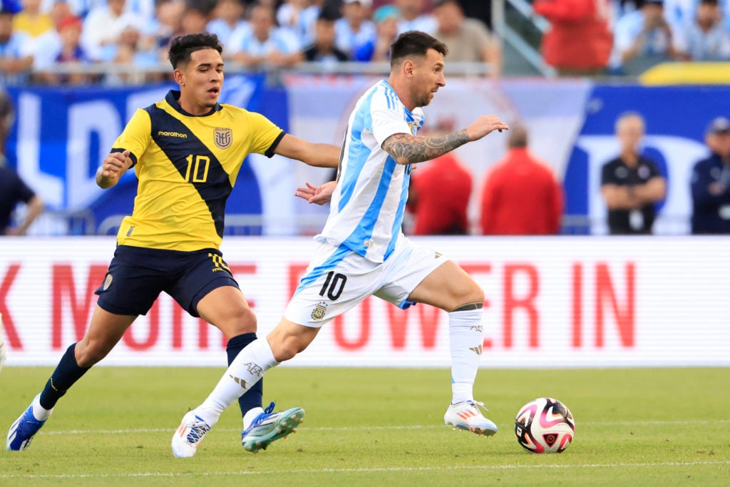 Lionel Messi #10 of Argentina makes a move on Kendry Paez #10 of Ecuador during the second half at Soldier Field on June 09, 2024 in Chicago, Illin...