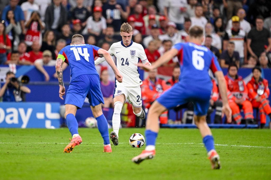 Milan kriniar of Slovakia, Cole Palmer of England and Norbert Gyömbér of Slovakia battle for the ball during the UEFA EURO 2024 round of 16 match b...