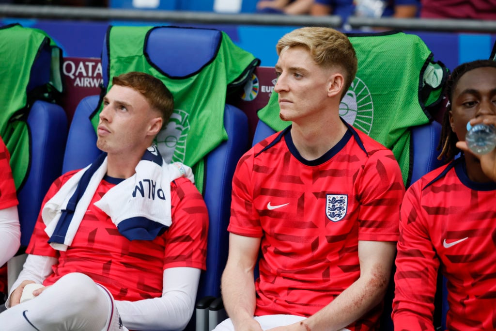 Cole Palmer and Anthony Gordon of England on the bench before the UEFA EURO 2024 round of 16 match between England and Slovakia at Arena AufSchalke...