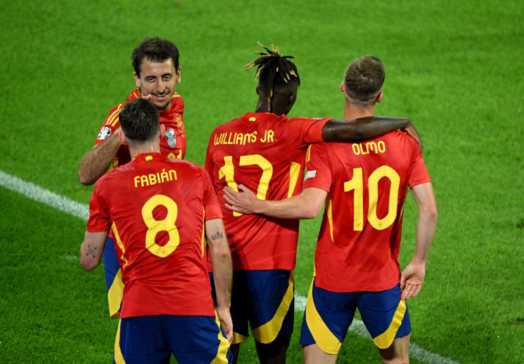Nico Williams of Spain (R2) celebrates with teammates Fabian Ruiz, Mikel Oyarzabal and Dani Olmo after scoring his team's third goal during the UEF...