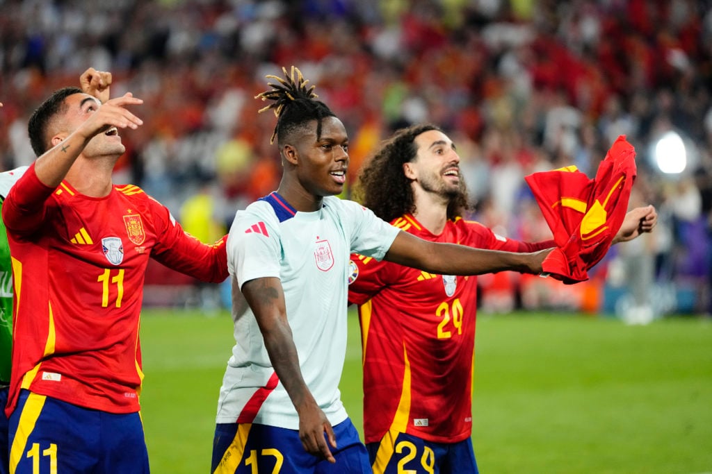 Lamine Yamal right winger of Spain and FC Barcelona and Marc Cucurella left-back of Spain and Chelsea FC celebrate victory after the UEFA EURO 2024...