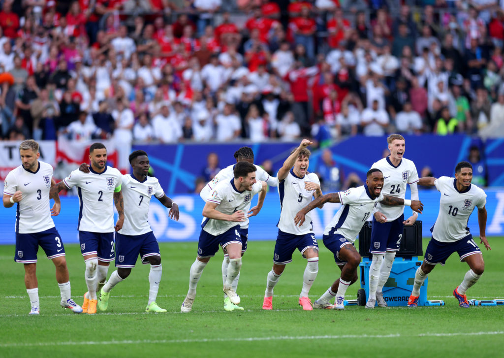 Players of England celebrates following the team's victory in the penalty shoot out after Trent Alexander-Arnold of England (not pictured) scores t...