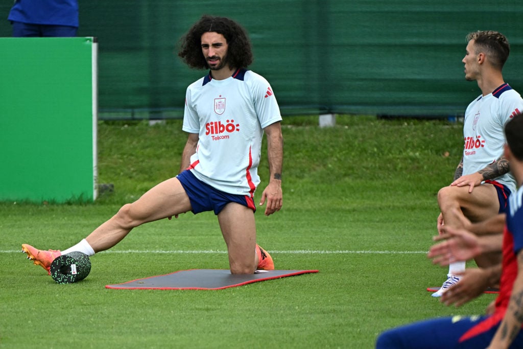 Spain's defender #24 Marc Cucurella (L) along with teammates take part in a training session at the team's base camp in Donaueschingen, on July 11,...